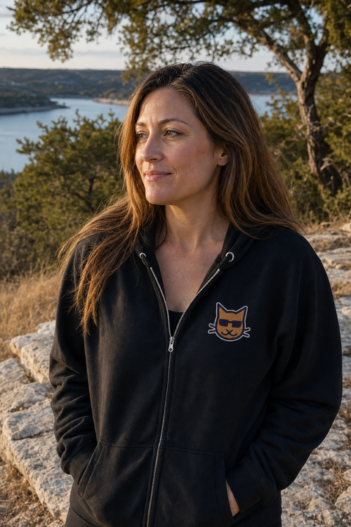 Blind Kitty Zip Hoodie in Black, worn in the Texas Hill Country (AI-generated scene)